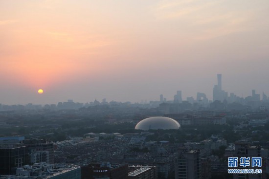 这是7月1日拍摄的北京日出.